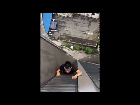 Extreme sports Chinese men climb high buildings #2