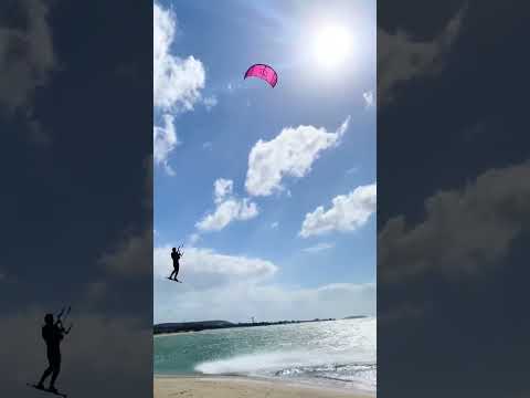 Kitesurfer free falling after a MASSIVE send! 🥵