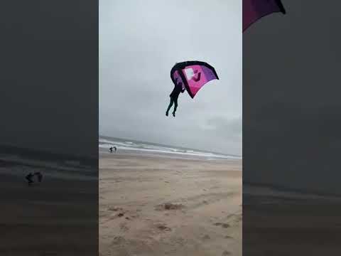 Kid flying crazy high with a wing in heavy wind! 🤯