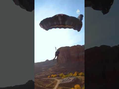 Athlete Does Backflip While BASE Jumping Off Clip | People Are Awesome #shorts