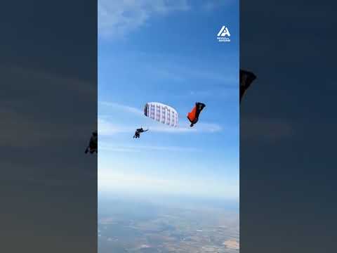 Wing Suit and Canopy Pilot Coordinate Mind-Blowing Trick | People Are Awesome #shorts