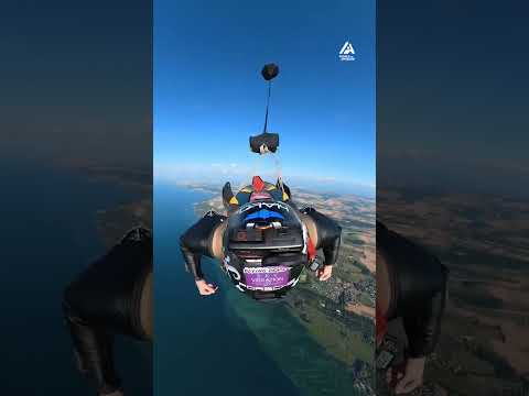 Group of Skydivers Fly Over Beautiful Landscape | People Are Awesome